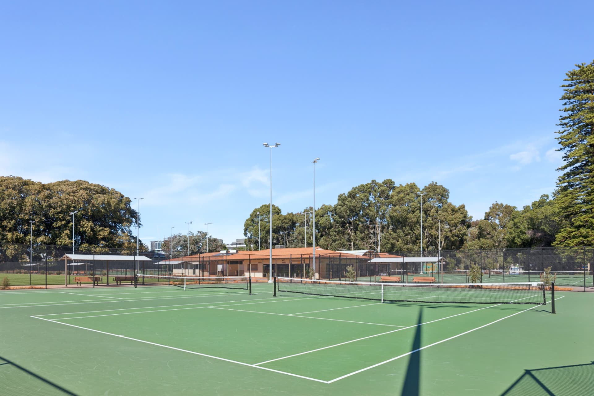 Rows of green acrylic tennis courts at Robertson Park